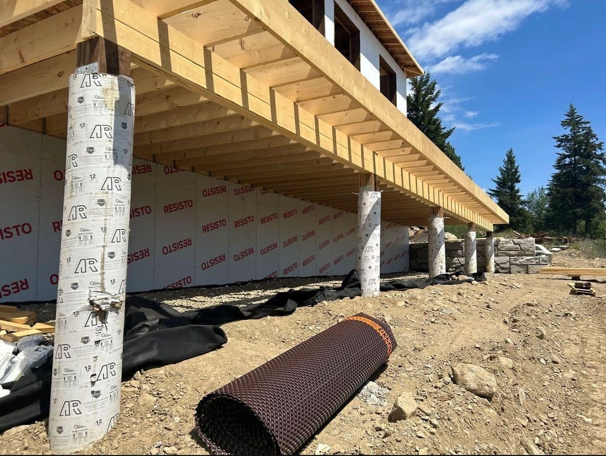 Geotechnical steep slope assessment and structural design for elevated foundation support.